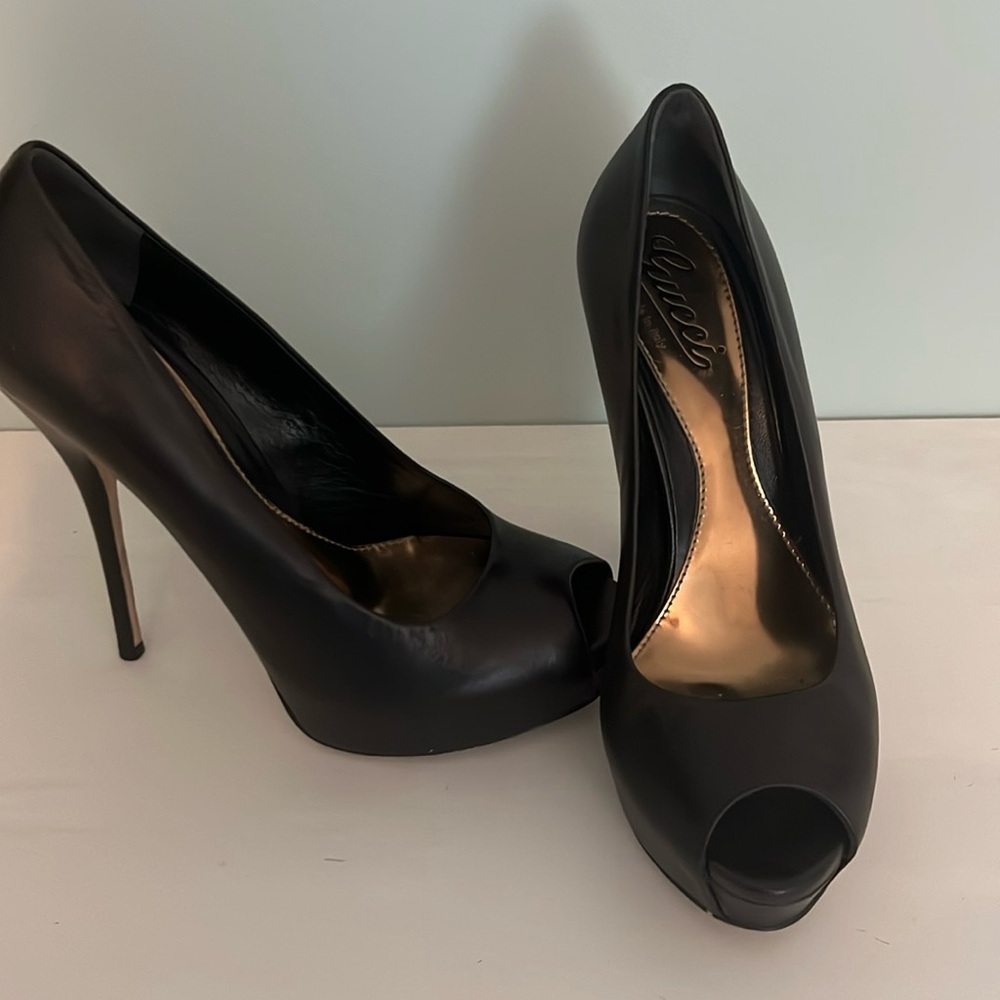 Gucci open toe heels.